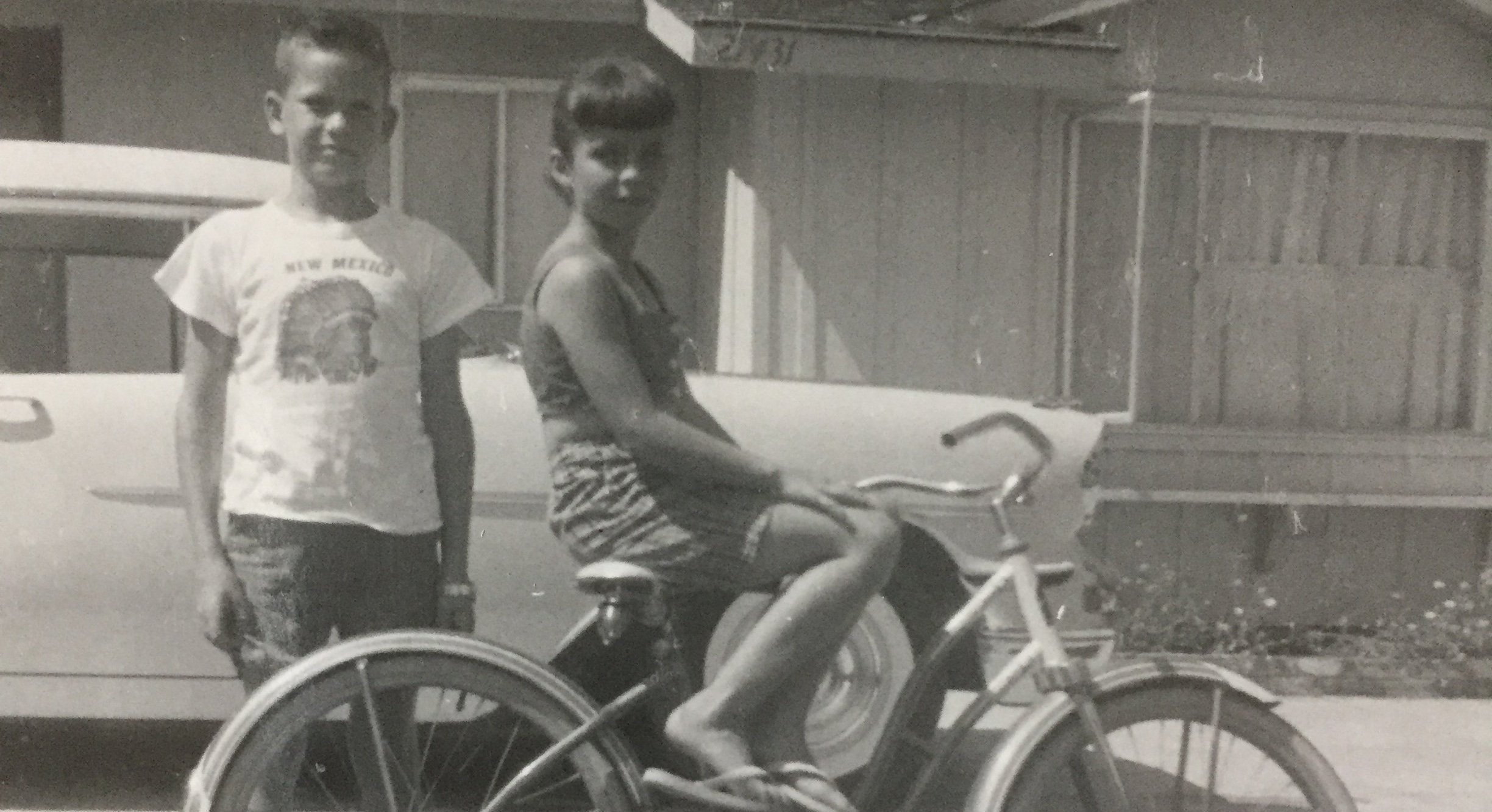Vintage photo of siblings playing